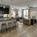 a kitchen with a bar and stools